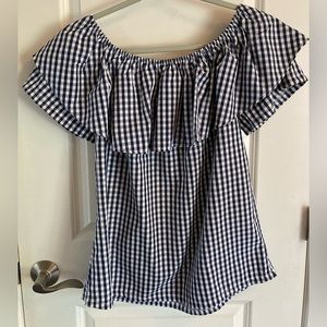 Gingham blue top.